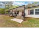 Inviting front porch with black railings and room for seating at 1957 Beth Haven Church Rd, Denver, NC 28037