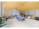 Garage interior with insulation, concrete floor and filled with boxes and items at 1957 Beth Haven Church Rd, Denver, NC 28037