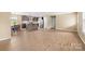 Spacious living space combining living, dining, and kitchen areas with ample lighting at 1957 Beth Haven Church Rd, Denver, NC 28037
