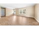 Open, airy living area with wood floors, natural light, and simple decor at 1957 Beth Haven Church Rd, Denver, NC 28037