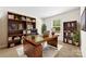 Office space with custom shelving, desk, and a window for natural light at 1957 Beth Haven Church Rd, Denver, NC 28037