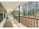 Well maintained porch, surrounded by views of the greenery and wooded area at 1957 Beth Haven Church Rd, Denver, NC 28037
