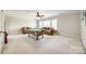 Large bonus room featuring a pool table, cozy seating, and plenty of space for entertainment at 2004 Ptarmigan Ct, Waxhaw, NC 28173