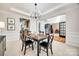 Open-concept dining area seamlessly connected to the kitchen and living spaces, perfect for entertaining and Gathering gatherings at 2004 Ptarmigan Ct, Waxhaw, NC 28173