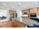 Modern kitchen with stainless steel appliances and a large center island at 2004 Ptarmigan Ct, Waxhaw, NC 28173