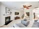 Inviting living room with a fireplace, neutral tones, and comfortable seating at 2004 Ptarmigan Ct, Waxhaw, NC 28173