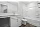 Bright bathroom showcasing modern fixtures and a sleek vanity with storage and countertop space at 2017 Embassy Ct # 51, Charlotte, NC 28213