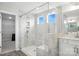 New bathroom featuring a glass-enclosed shower with marble-style tile and built-in bench at 2017 Embassy Ct # 51, Charlotte, NC 28213
