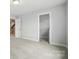 Bright bedroom with a closet and ensuite bathroom entrances for convenience at 2017 Embassy Ct # 51, Charlotte, NC 28213