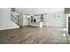 Modern kitchen featuring an island, stainless steel appliances, and stone countertops at 2017 Embassy Ct # 51, Charlotte, NC 28213