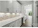 Pantry with shelves, counter, and a drink cooler at 2017 Embassy Ct # 51, Charlotte, NC 28213