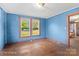 Bedroom featuring hardwood floors and great natural light from two windows at 203 Ackert Ave, Salisbury, NC 28144