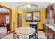 Eat-in kitchen featuring a dining table and black gas range at 203 Ackert Ave, Salisbury, NC 28144