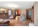 Spacious living room with hardwood floors, brick fireplace, and natural light at 203 Ackert Ave, Salisbury, NC 28144