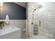 Modern bathroom featuring a glass shower, and sleek fixtures and vanity at 2066 Marquesas Ave, Fort Mill, SC 29708