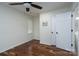 Simple bedroom with hardwood floors, ceiling fan, a window, and closet at 2066 Marquesas Ave, Fort Mill, SC 29708