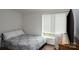 Bedroom with a large window, a comfortable bed and stylish furnishings at 2066 Marquesas Ave, Fort Mill, SC 29708