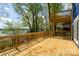 Spacious wooden deck with railing offering picturesque water views, ideal for outdoor relaxation and entertaining at 2066 Marquesas Ave, Fort Mill, SC 29708