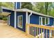Charming home exterior with a well-kept deck and vibrant blue siding, blending style and outdoor living at 2066 Marquesas Ave, Fort Mill, SC 29708