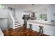 Modern kitchen with stainless steel appliances, white cabinetry, and a stylish breakfast bar at 2066 Marquesas Ave, Fort Mill, SC 29708