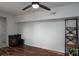 Cozy living room featuring hardwood floors, accent furniture, and a faux fireplace at 2066 Marquesas Ave, Fort Mill, SC 29708
