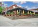 Inviting exterior with a stepped entrance and potted plants, enhancing the curb appeal of the building at 2094 Euclid Ave, Charlotte, NC 28203