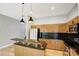 Kitchen featuring an island, stainless steel appliances, and modern cabinets at 2094 Euclid Ave, Charlotte, NC 28203
