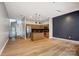 Open concept living area with kitchen, island, and staircase at 2094 Euclid Ave, Charlotte, NC 28203