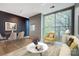 Bright living area featuring a large window and modern furnishings at 2094 Euclid Ave, Charlotte, NC 28203