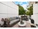 Inviting outdoor patio with comfortable seating, dining area, and lush greenery, perfect for relaxation and entertaining at 2094 Euclid Ave, Charlotte, NC 28203