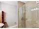 This modern shower showcases neutral tiling, a glass door, and sleek hardware in an upscale bathroom at 2094 Euclid Ave, Charlotte, NC 28203