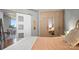 Bright bedroom featuring a closet, view to a dining area, and modern decor at 210 N Church St # 3507, Charlotte, NC 28202