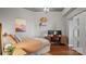 Cozy bedroom featuring a work desk, wood floors, and modern décor at 210 N Church St # 3507, Charlotte, NC 28202