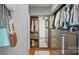 Organized walk-in closet with ample storage space and wood flooring at 210 N Church St # 3507, Charlotte, NC 28202