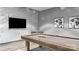 Entertainment room featuring a pool table, TV, and stylish decor at 210 N Church St # 3507, Charlotte, NC 28202