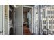 In unit washer and dryer plus view of the city from an open door at 210 N Church St # 3507, Charlotte, NC 28202