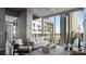 Bright living room with floor-to-ceiling windows and cityscape views at 210 N Church St # 3507, Charlotte, NC 28202