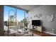 Stylish living room with floor-to-ceiling windows and sleek decor at 210 N Church St # 3507, Charlotte, NC 28202