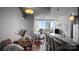 Open-concept living area with dining space and floor to ceiling windows at 210 N Church St # 3507, Charlotte, NC 28202