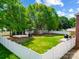 The expansive backyard offers a basketball court, shed, pergola, and volleyball court for outdoor fun at 2808 Park Ridge Blvd, Rock Hill, SC 29732