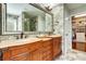Elegant bathroom featuring double vanity, large mirror, and access to a walk-in closet at 2808 Park Ridge Blvd, Rock Hill, SC 29732