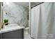 Chic bathroom featuring a marble-tiled walk-in shower and modern fixtures at 2808 Park Ridge Blvd, Rock Hill, SC 29732