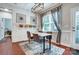 Bright dining area with modern lighting, brick accent wall, and stylish furnishings at 2808 Park Ridge Blvd, Rock Hill, SC 29732