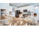 Close-up of a kitchen featuring a large granite countertop, stainless steel appliances, and modern fixtures at 2808 Park Ridge Blvd, Rock Hill, SC 29732