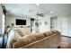 Spacious living room featuring a comfortable sofa, built-in cabinets, and stylish decor at 2808 Park Ridge Blvd, Rock Hill, SC 29732