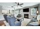 Open living area with fireplace, TV, neutral décor, and adjacent dining area at 2808 Park Ridge Blvd, Rock Hill, SC 29732