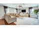 Cozy living room with a large sectional sofa, wooden coffee table, and ample natural light at 2808 Park Ridge Blvd, Rock Hill, SC 29732