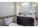 Bathroom featuring a vanity with storage and a large framed mirror at 2811 Saint James Church Rd, Denver, NC 28037