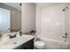 Bright bathroom featuring a vanity with sink and a shower-over-tub with tiled surround at 2811 Saint James Church Rd, Denver, NC 28037