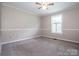Spacious bedroom with a ceiling fan and large window at 2811 Saint James Church Rd, Denver, NC 28037